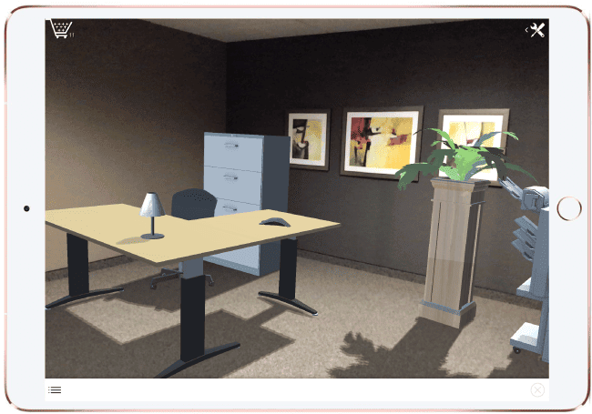 A digital tablet displays a virtual office scene with a desk, chair, filing cabinet, indoor plant, lamp, two wall art pieces, and a copier in the corner.