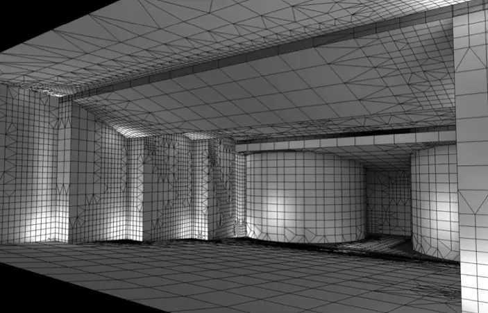 Experience the precision of AGi32 Version 22.0 with a 3D wireframe model featuring an empty room where curved and straight walls, ceiling, and floor surfaces are elegantly draped in a grid pattern.