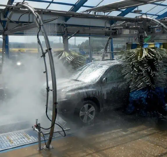 SUV going through car wash