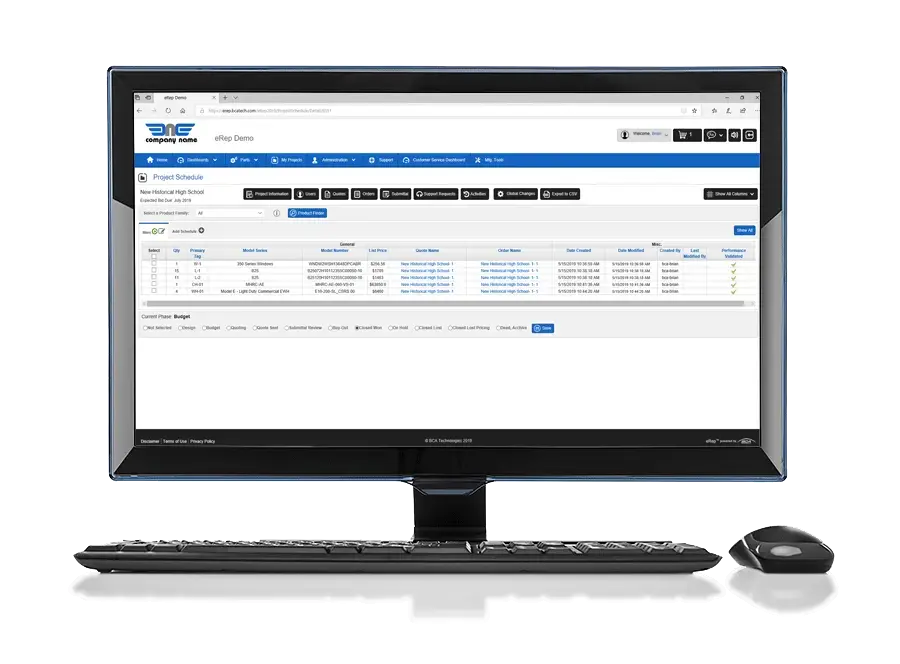 A computer monitor showcases the eRep Product Selector alongside a project schedule interface, with a keyboard and mouse resting on a pristine white surface.