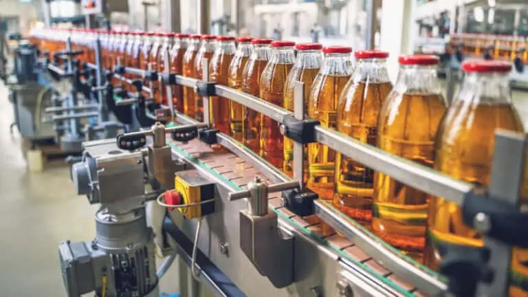 juice bottles on conveyor belt