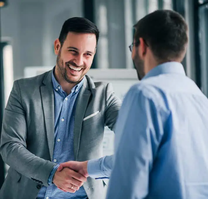 2 businessmen shaking hands