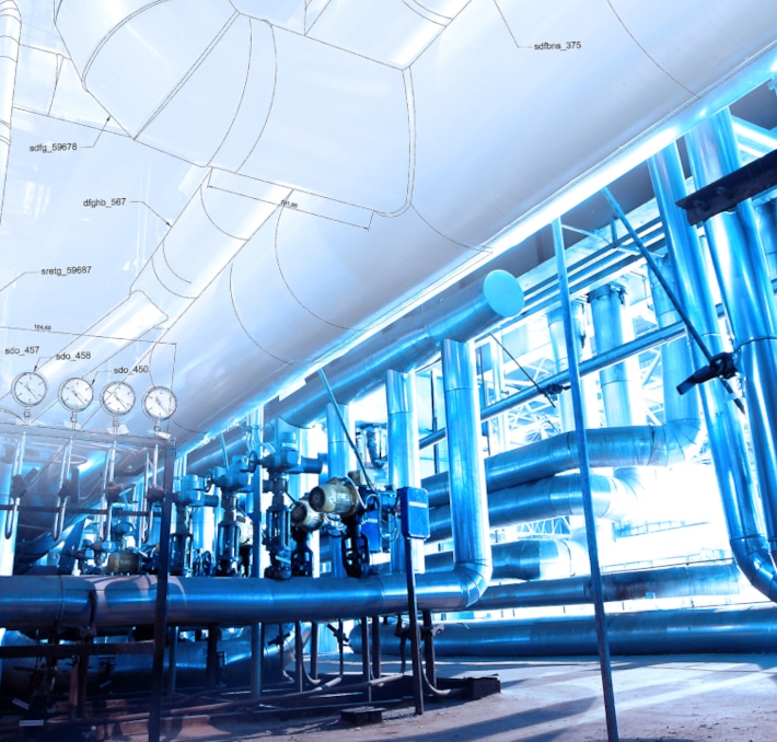 Industrial facility with metal pipes, gauges, and valves, overlaid with technical schematic lines and labels, illustrating monitoring or design of a complex piping system using a flo systems model.