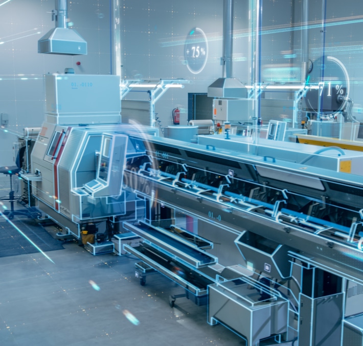 Modern automated industrial machine in a factory setting with digital interface overlays displaying performance data.